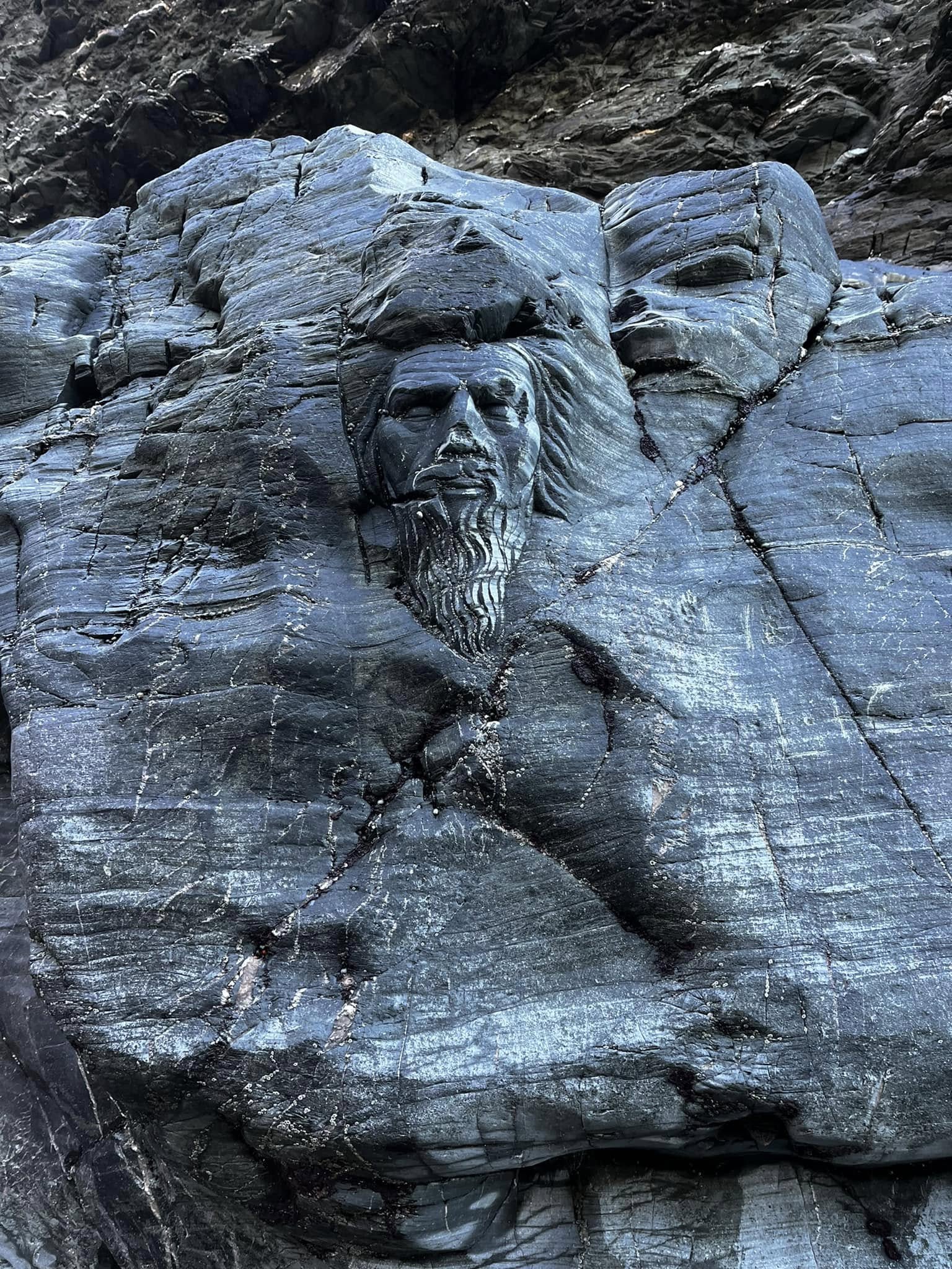 King arthur carved into stone at Tintagel
