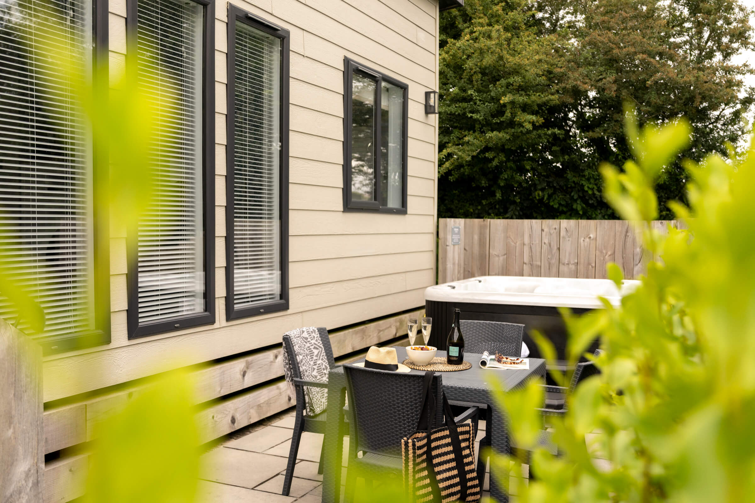 Lodge 12 decking and hot tub set up view at St Mabyn