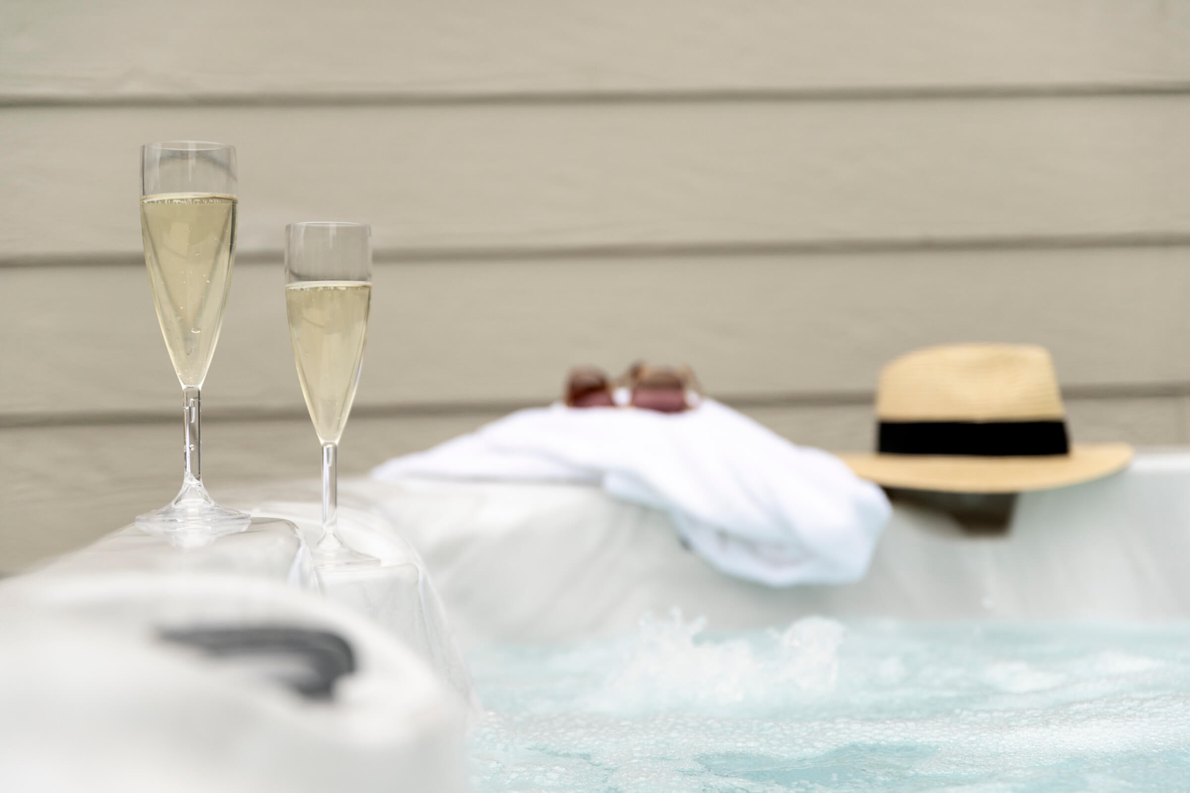 Lodge 12 hot tub set up with prosecco at St Mabyn